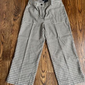 Brown plaid wide legged, cropped dress pants.